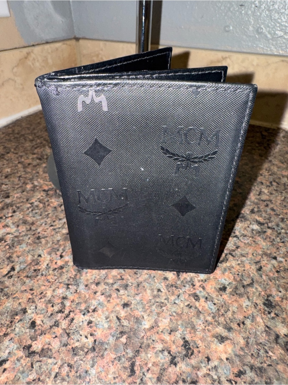 MCM Black Embossed Monogram Bi-Fold Wallet like new